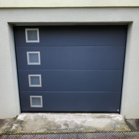 Porte-de-garage-sectionnelle-motorisee-sur-Burnhaupt-le-haut.png